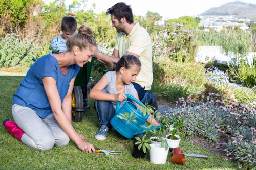 Gardener working in a Coulsdon garden in spring